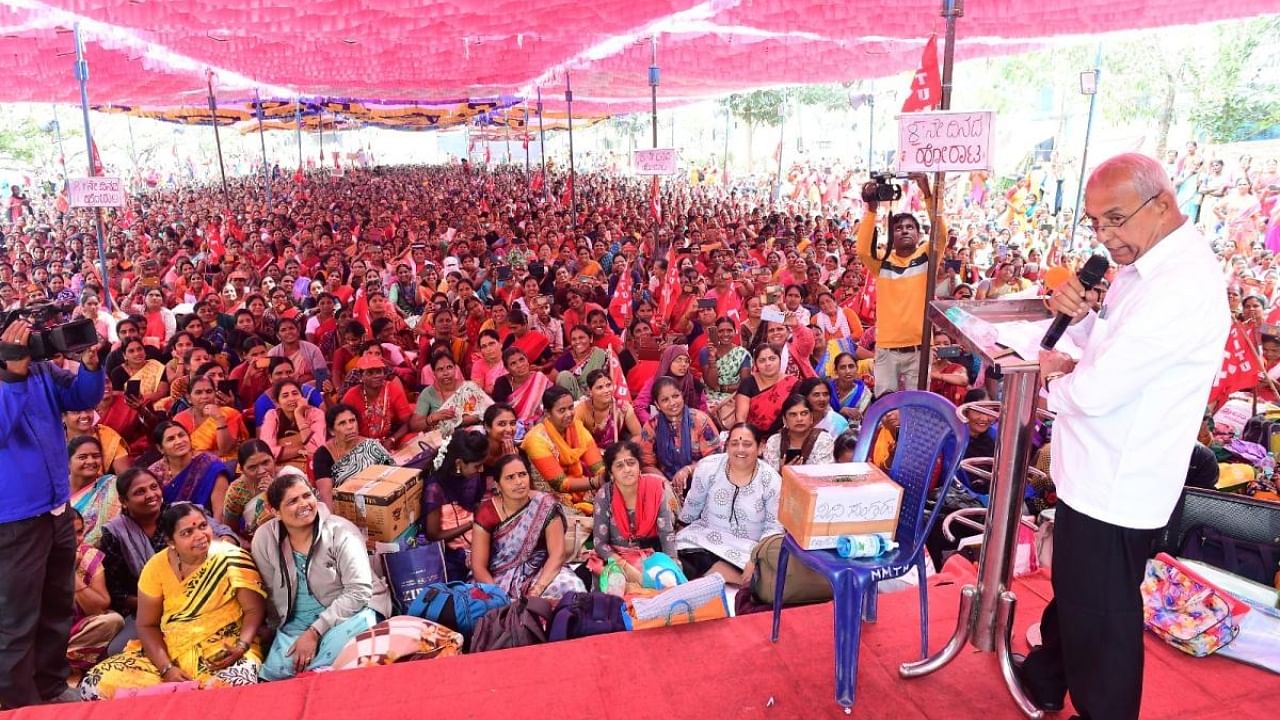 Women and Child Development Minister Halappa Achar addresses the protesting the anganwadi workers in Bengaluru on Wednesday. Credit: DH Photo