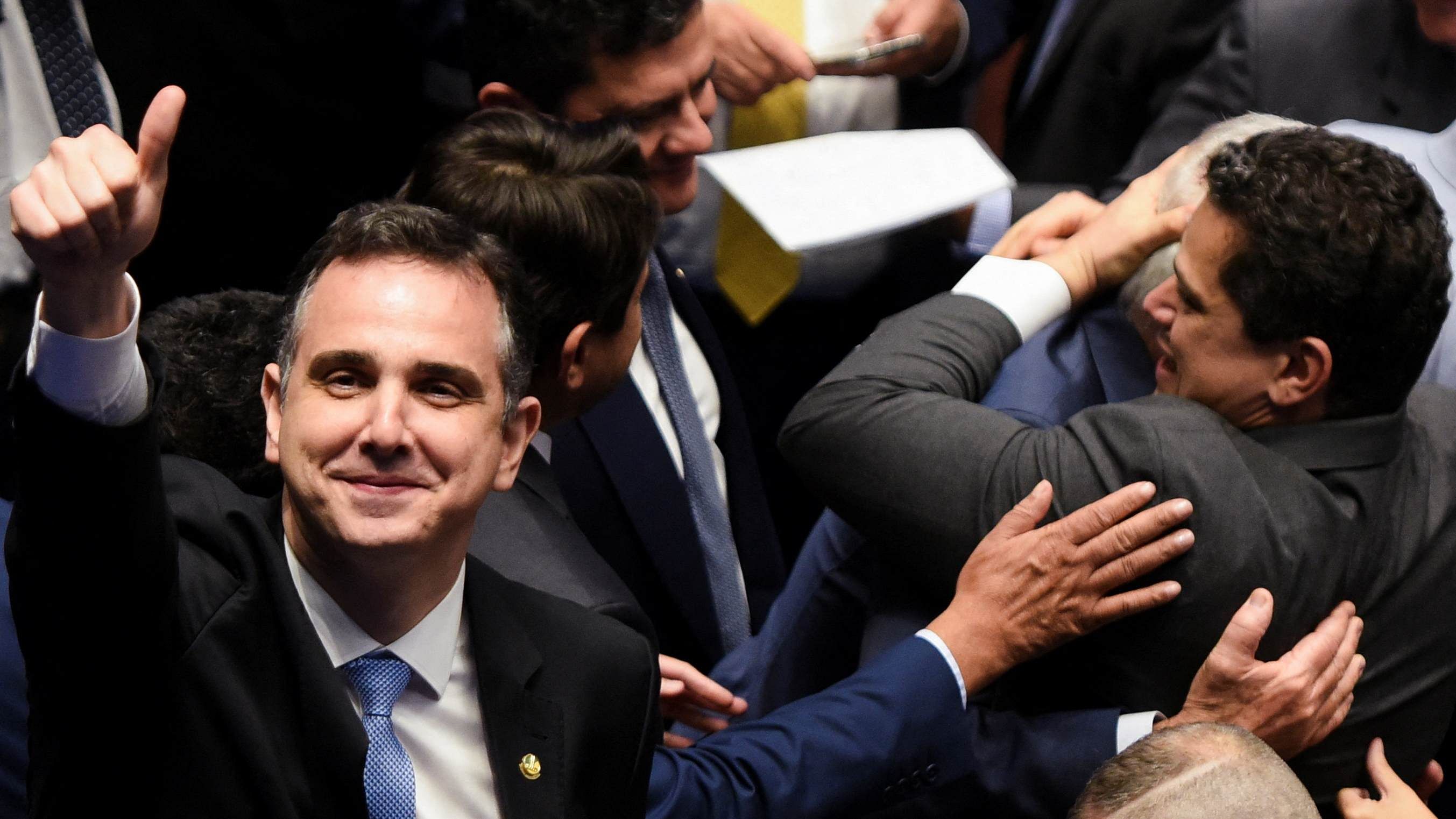 Rodrigo Pacheco gestures after being re-elected as the senate president in Brasilia, Brazil. Credit: Reuters Photo