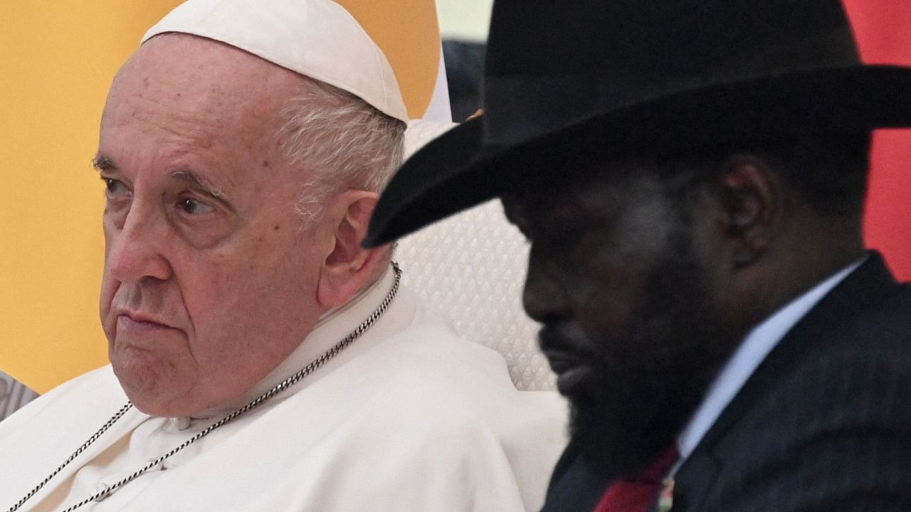 Pope Francis (L) and the President of South Sudan Salva Kiir (R) attend meeting with authorities, leaders of civil society and the diplomatic corps, in the garden of the Presidential Palace in Juba, South Sudan, on February 3, 2023. Credit: AFP Photo