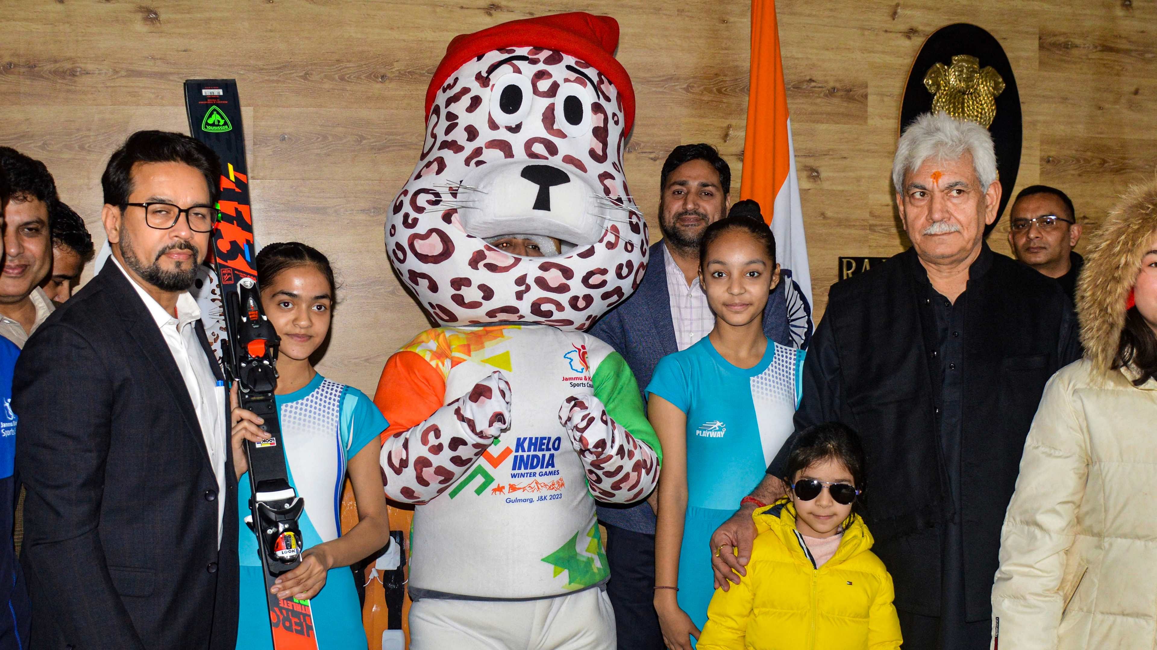 Anurag Thakur (L) and J&K Lt. Governor launch the mascot of the 3rd edition of Khelo India Winter Games. Credit: PTI Photo
