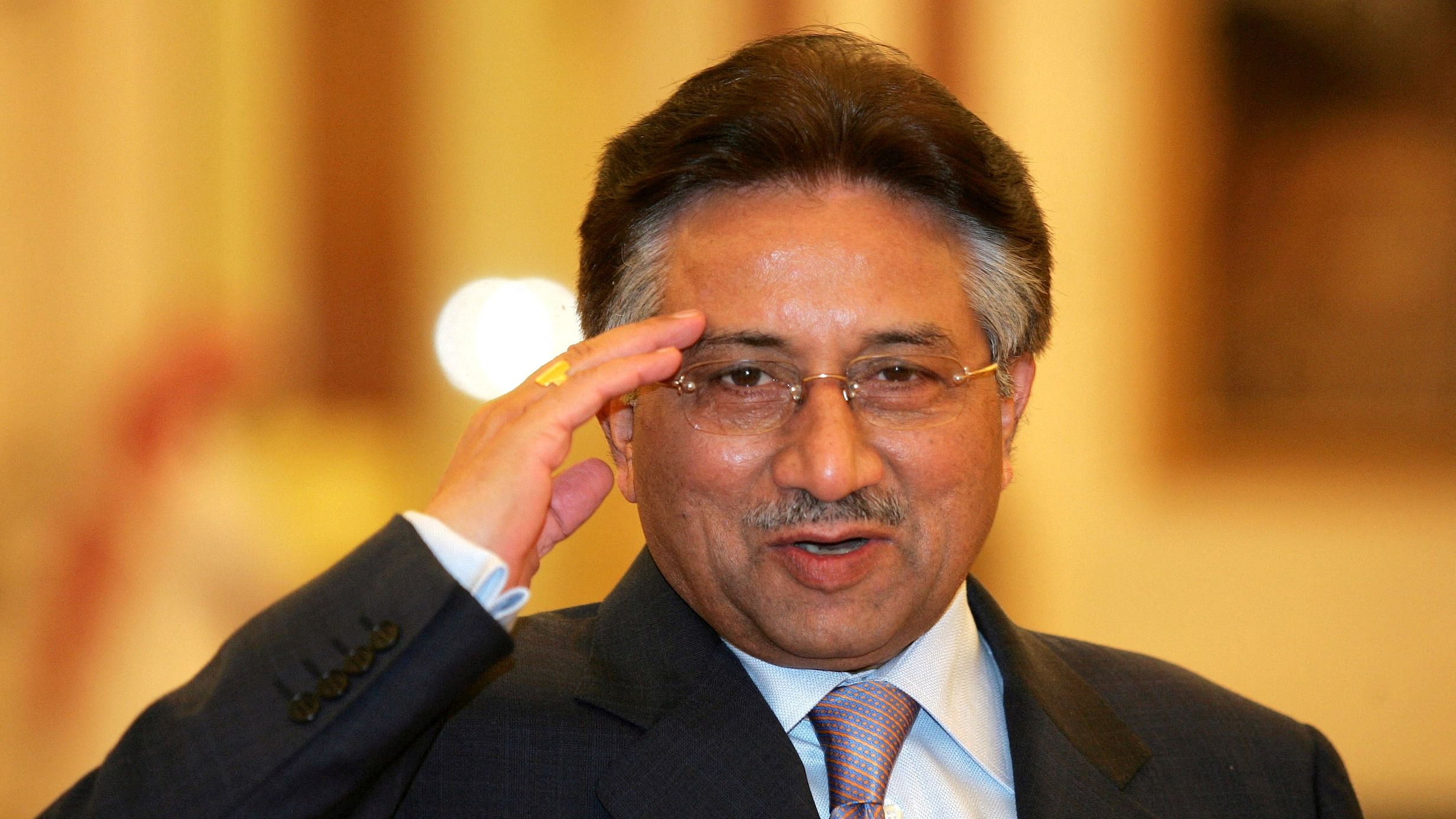 Pakistani President Pervez Musharraf salutes as he arrives for the Organisation of Islamic Conference (OIC) meeting in Mecca December 8, 2005. Credit: Reuters Photo