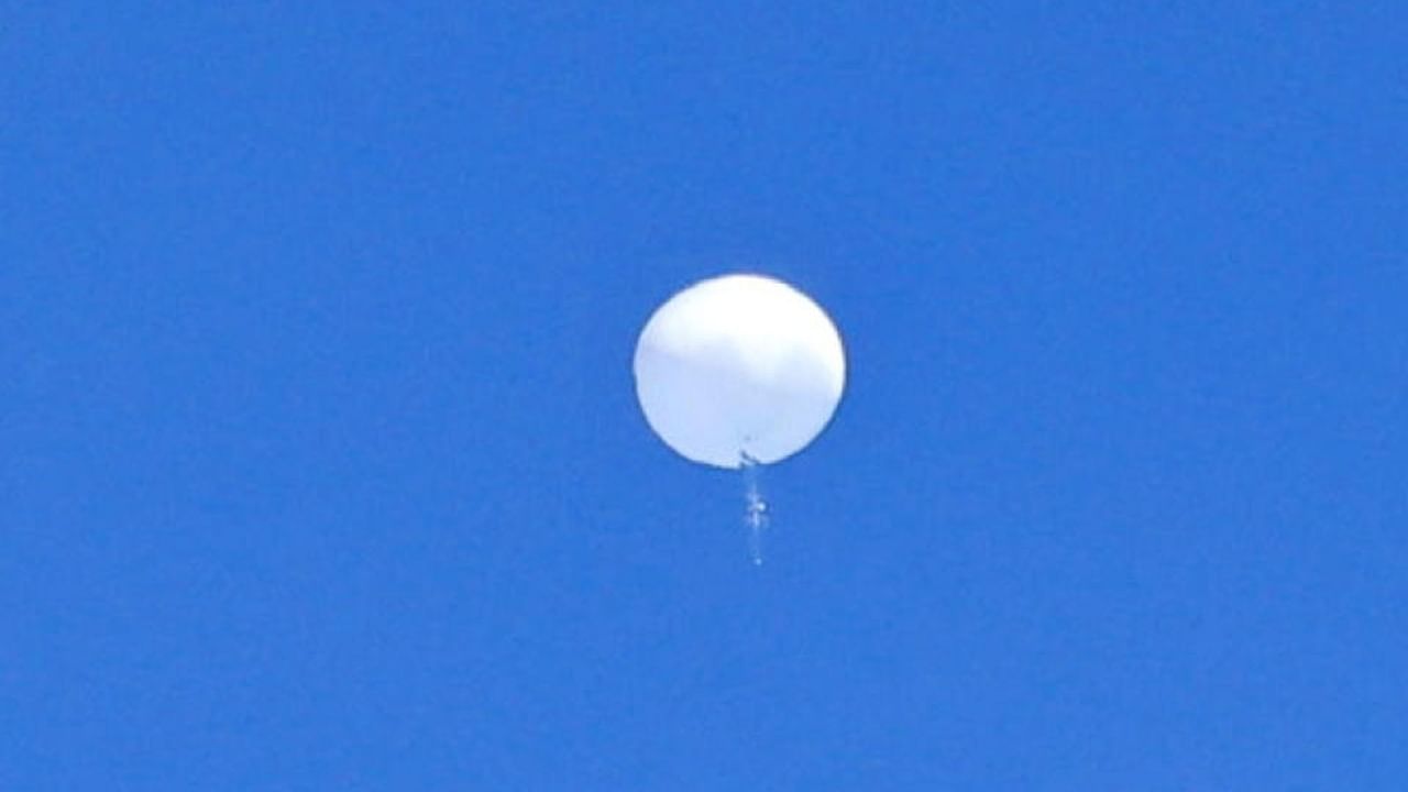 Suspected Chinese spy balloon is seen before it was shot down off the coast of Garden City, South Carolina. Credit: Reuters Photo