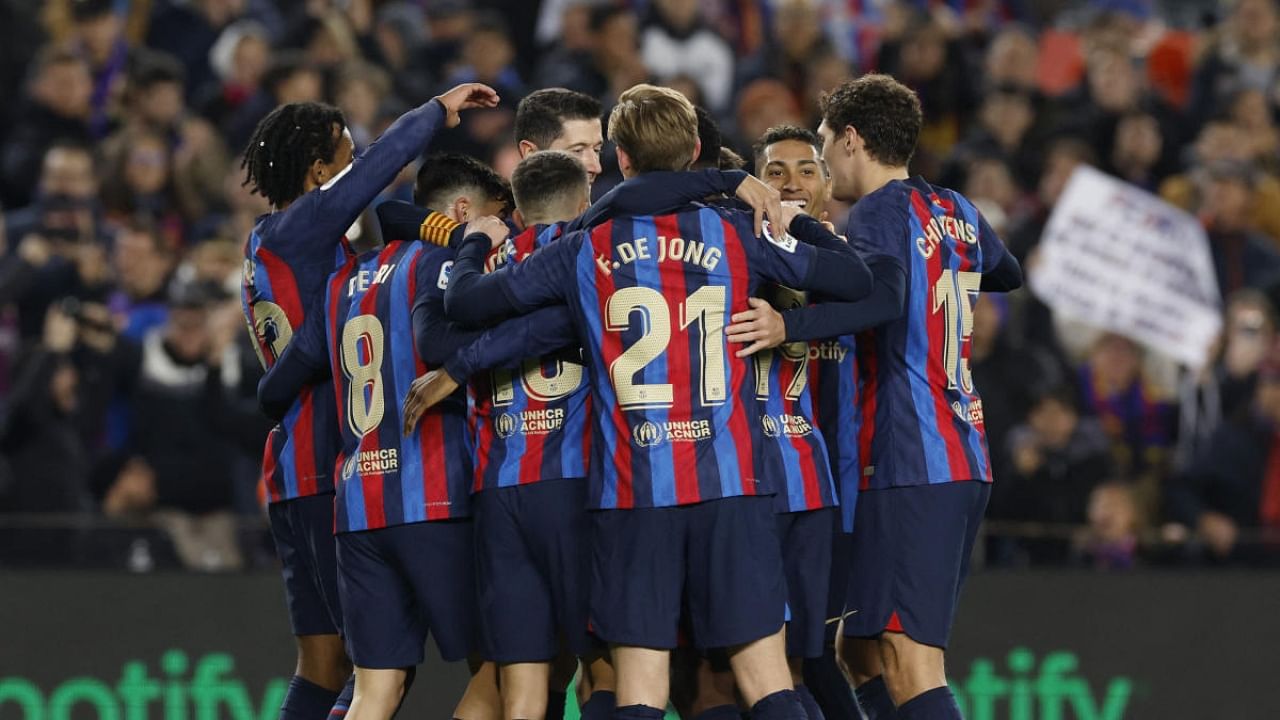 Barcelona's Gavi celebrates scoring their second goal with teammates. Credit: Reuters Photo