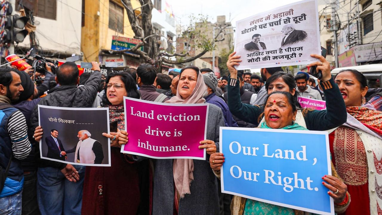Congress workers stage a protest march over Adani row and anti-encroachment drive by the UT administration, in Jammu, Monday, Feb. 6, 2023. Credit: PTI Photo