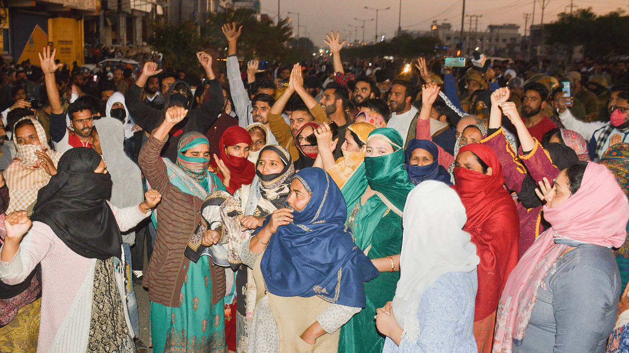 Protest against anti-encroachment drive. Credit: PTI Photo