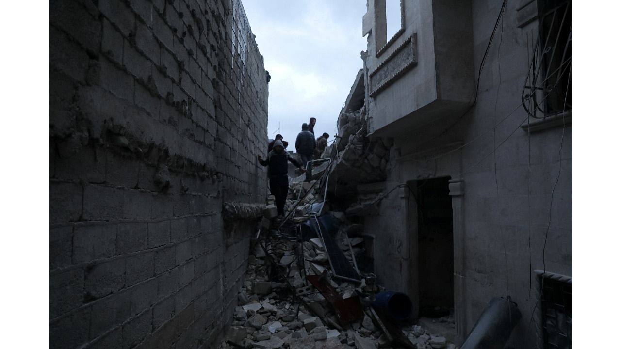 Rescuers search for survivors under the rubble. Credit: Reuters Photo