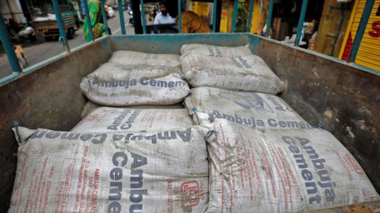 A view shows Ambuja Cement bags. Representative Image. Credit: Reuters Photo
