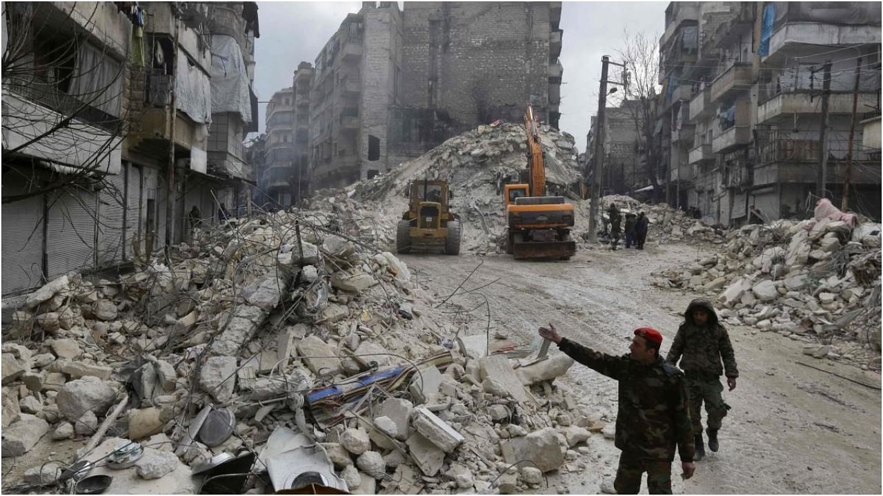 Syrian rescue teams search for victims and survivors in the city of Hama following a deadly earthquake on February 6, 2023. Credit:  AFP Photo