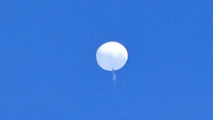 Suspected Chinese spy balloon is seen before it was shot down off the coast of Garden City, South Carolina. Credit: Reuters Photo  