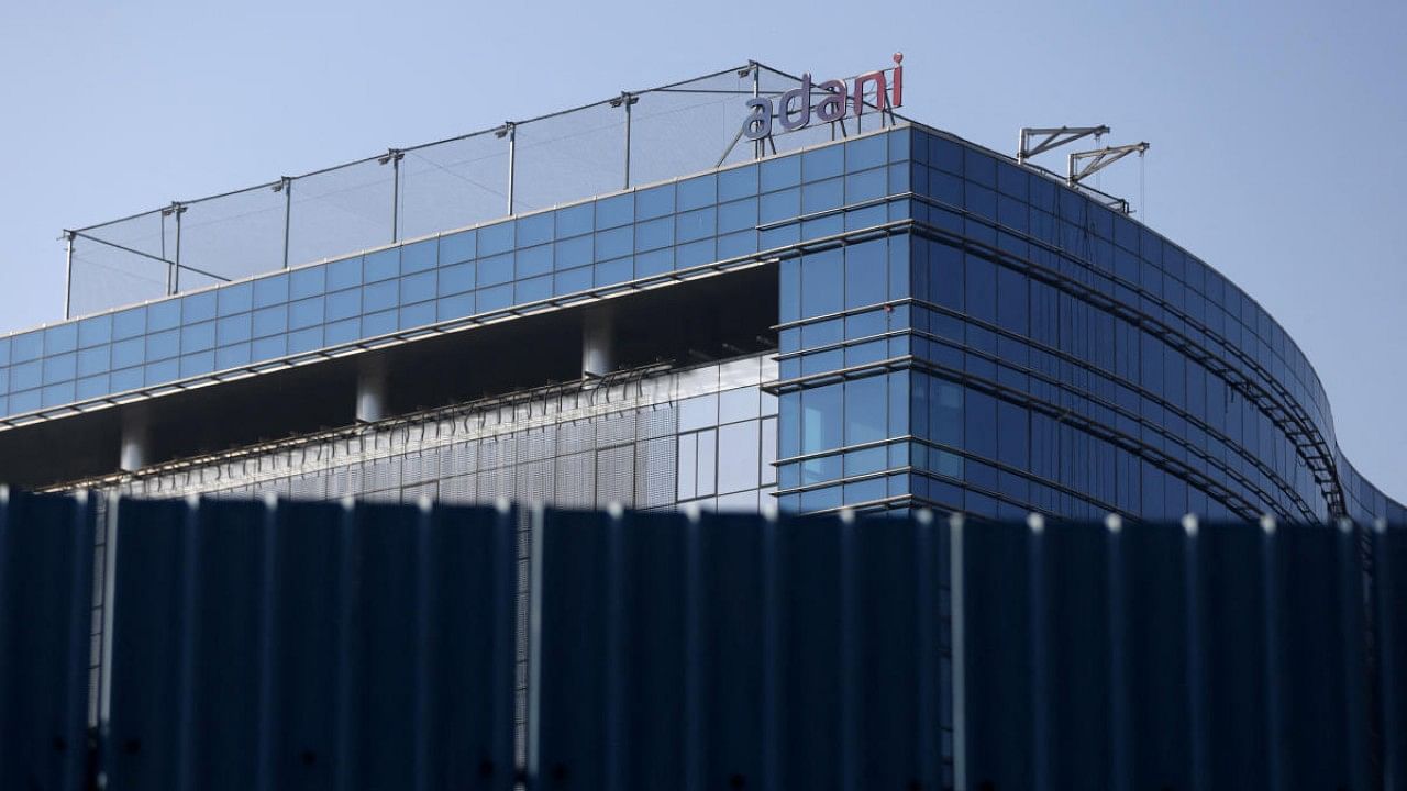 A logo of the Adani Group is seen on a commercial complex in Mumbai. Credit: Reuters Photo