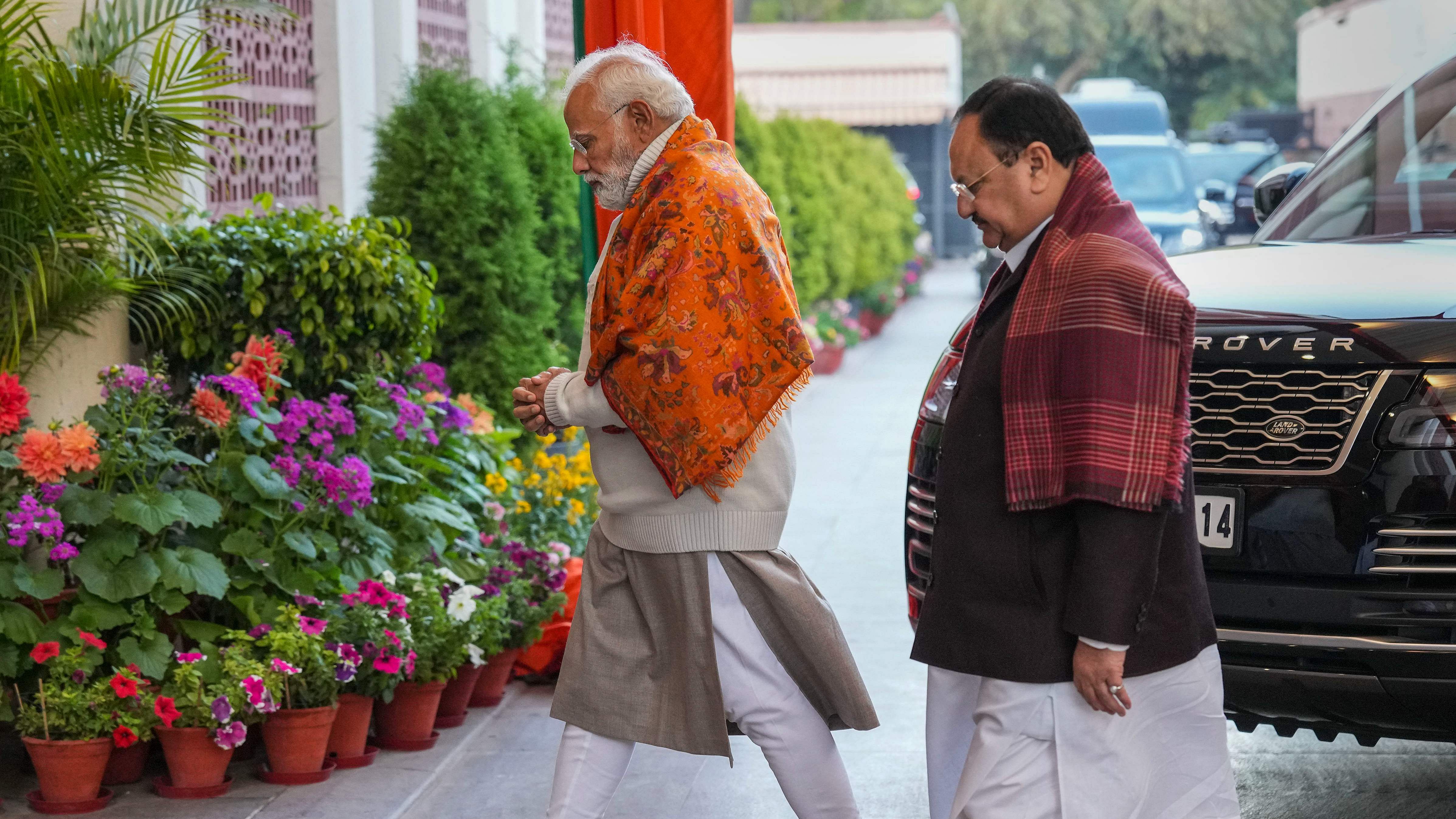 Prime Minister Narendra Modi and BJP National President JP Nadda arrive to attend the BJP Central Election Committee meeting for Nagaland Legislative Assembly elections, at the party Headquarters in New Delhi. Credit: PTI Photo