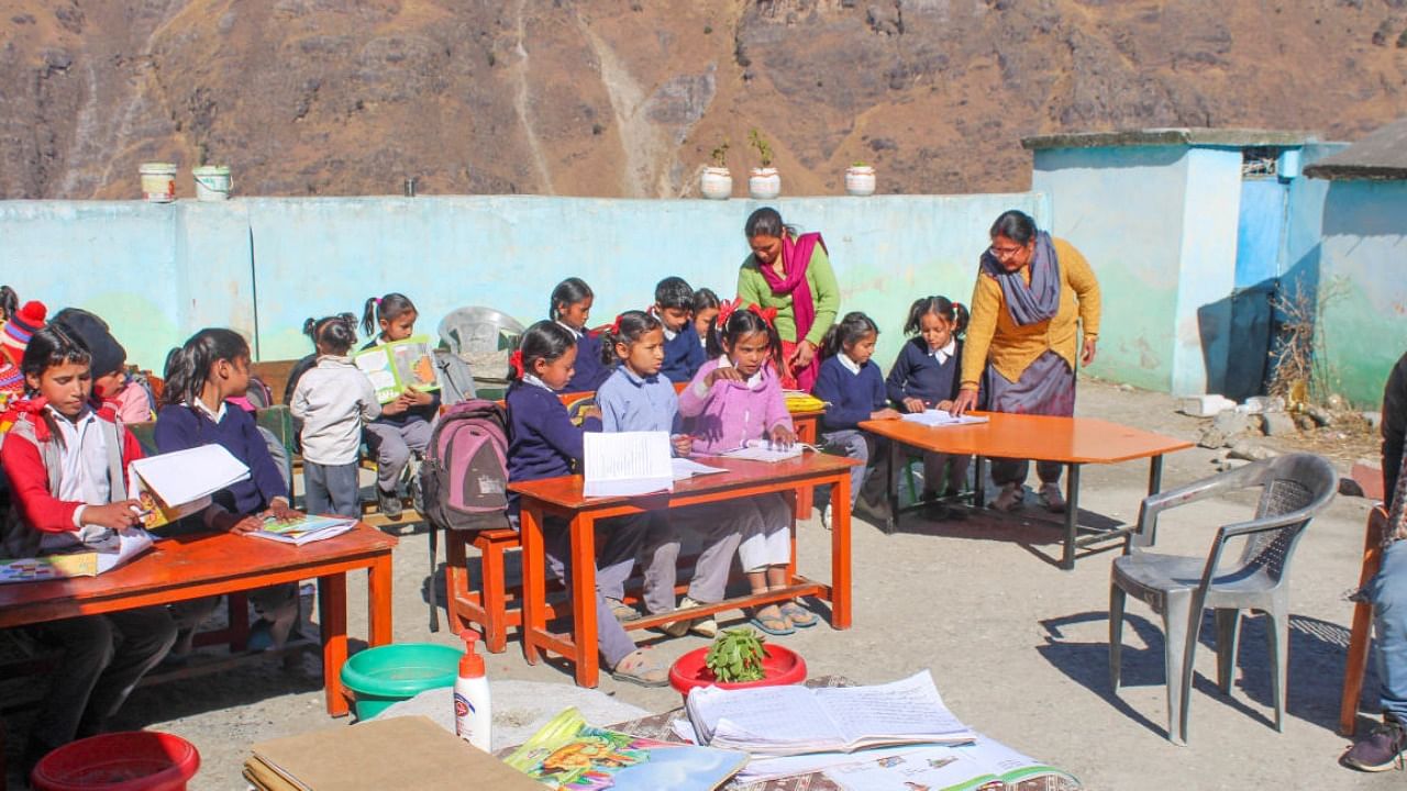 School children at a school, in Singhdhar, a ward in Joshimath town of Uttarakhand. Credit: PTI File Photo