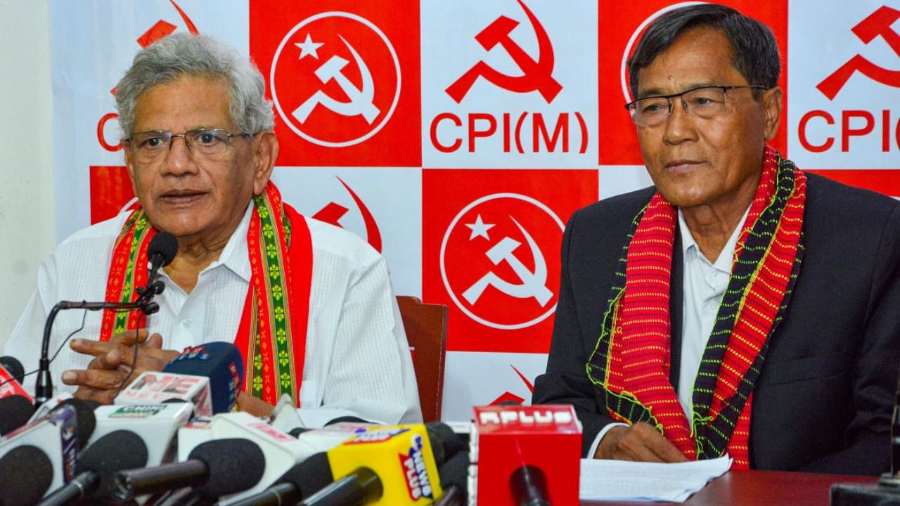 Sitaram Yechury with CPI(M) Tripura Secretary Jitendra Chaudhary addresses a press conference, in Agartala. Credit: PTI Photo