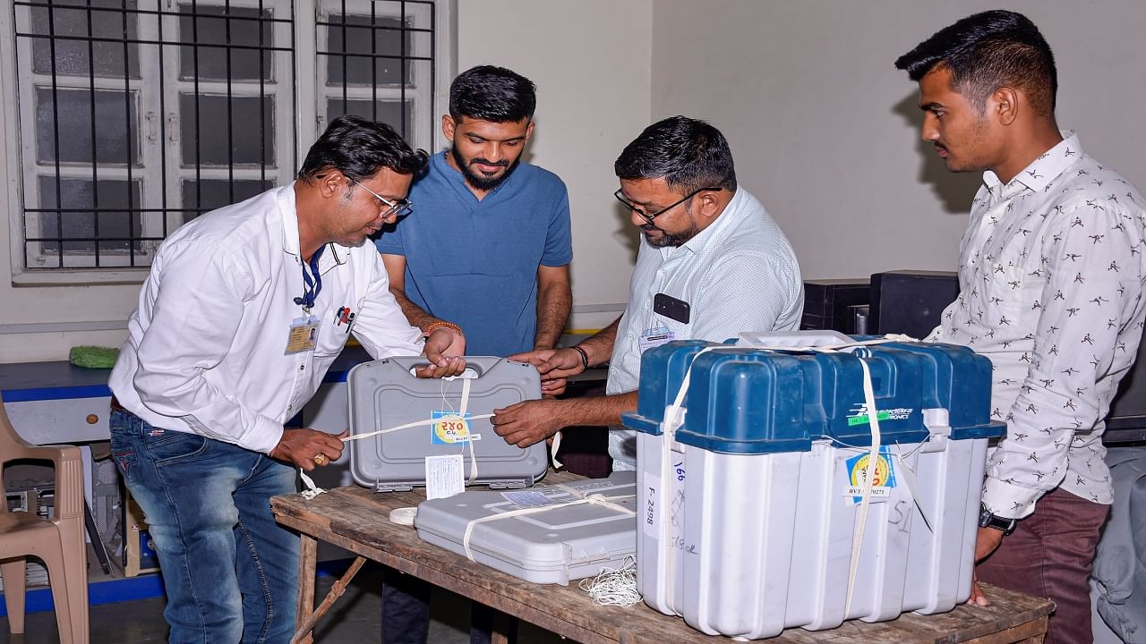 EVMs and VVPATs being sealed to be transported to strong room. Credit: PTI Photo