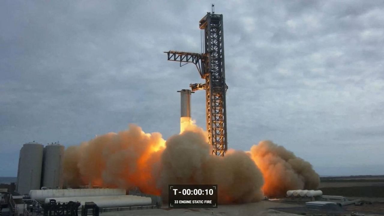 Test-firing of the massive engines on the most powerful rocket ever built, designed to send astronauts to the Moon and beyond, at a SpaceX base in Boca Chica, Texas. Credit: AFP Photo