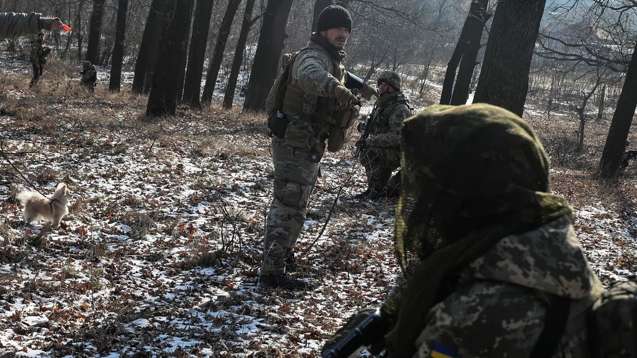 Retired foreign military professionals conduct a military exercise for Ukrainian service members, amid Russia's attack on Ukraine. Credit: Reuters Photo