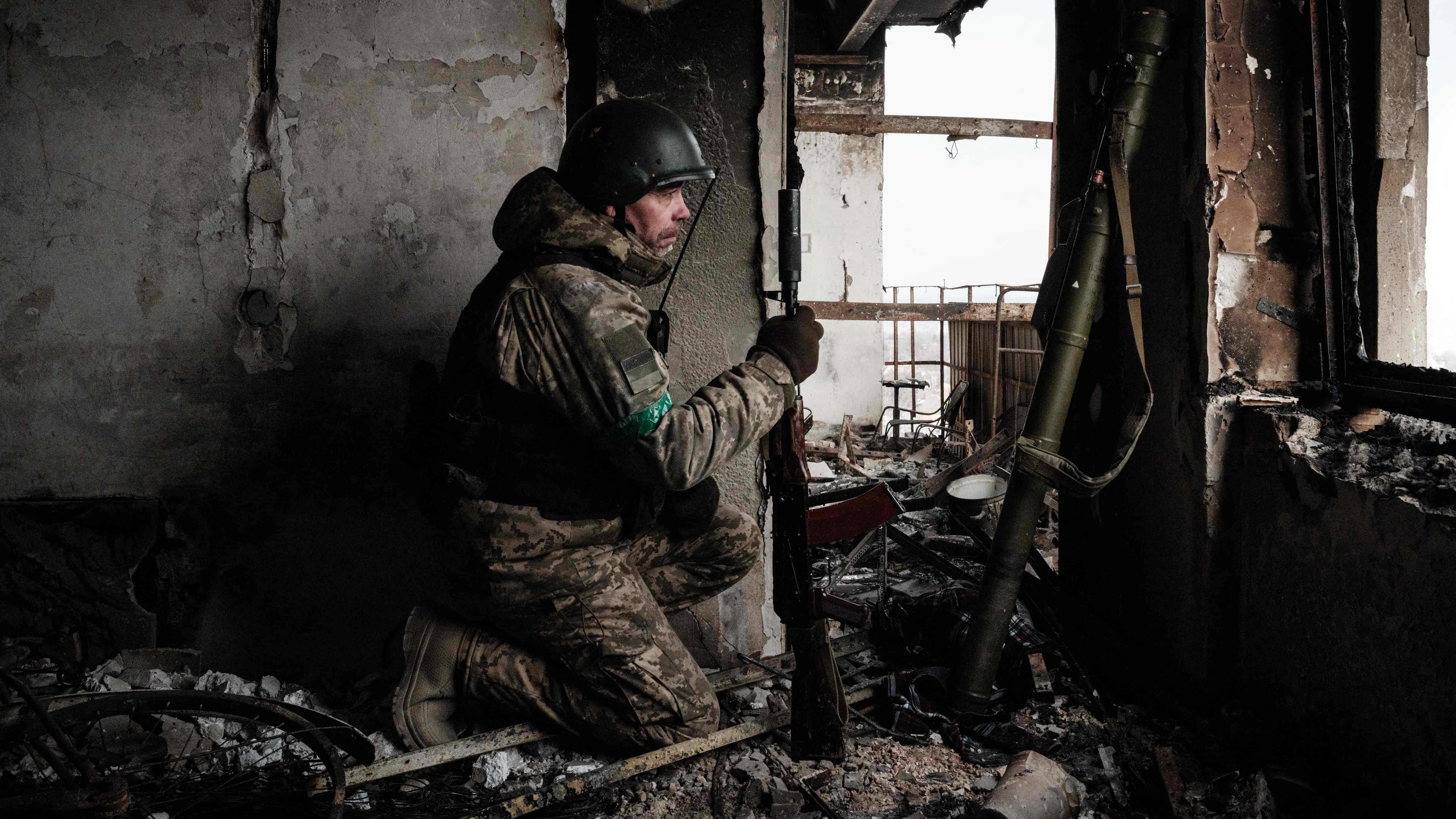 A Ukrainian serviceman of the State Border Guard Service works in a position in Bakhmut on February 9, 2023, amid the Russian invasion of Ukraine. Credit: AFP Photo