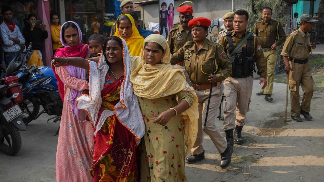 People react after police arrested their relatives allegedly involved in child marriages, during Assam government's state-wide crackdown on child marriages, near Mayong police station in Morigaon district of Assam on February 4, 2023. Credit: AFP Photo