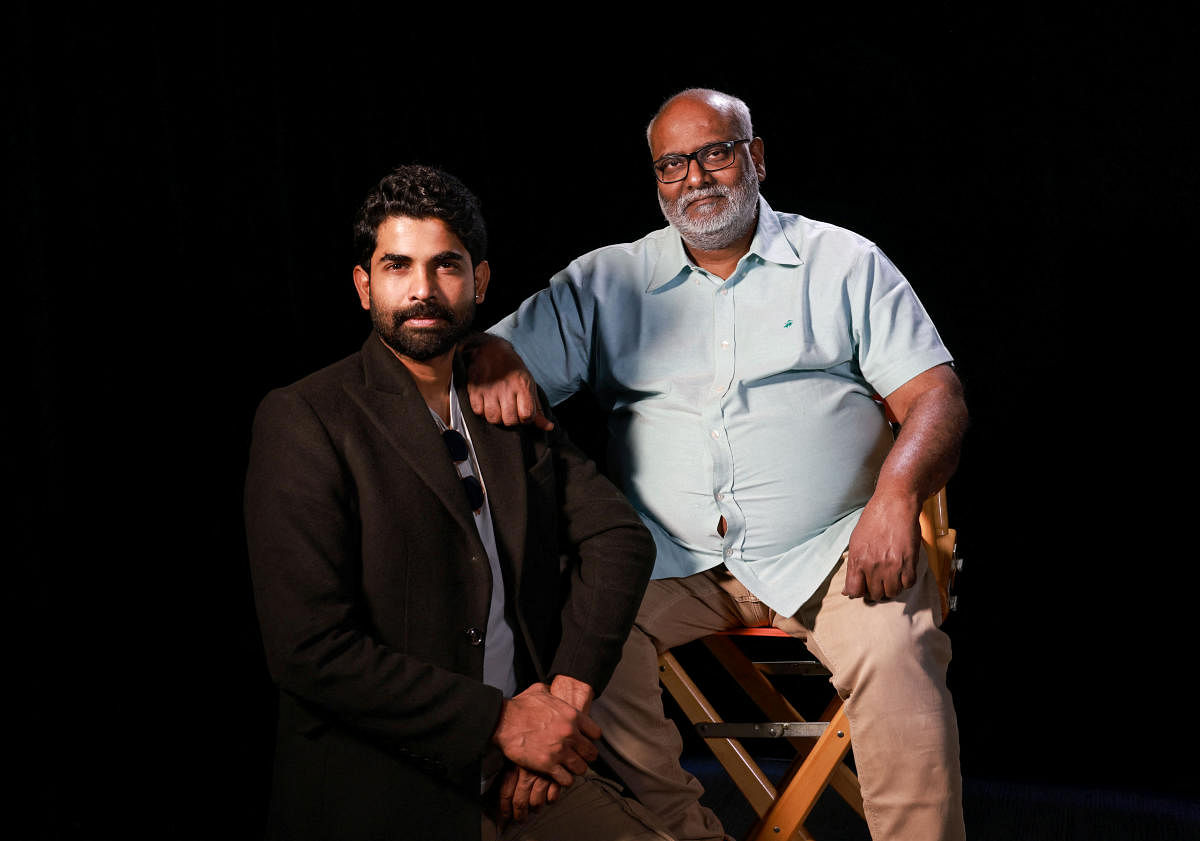 Music director M M Keeravani with filmmaker SS Rajamouli’s son and composer SS Karthikeya. Credit: Reuters Photo