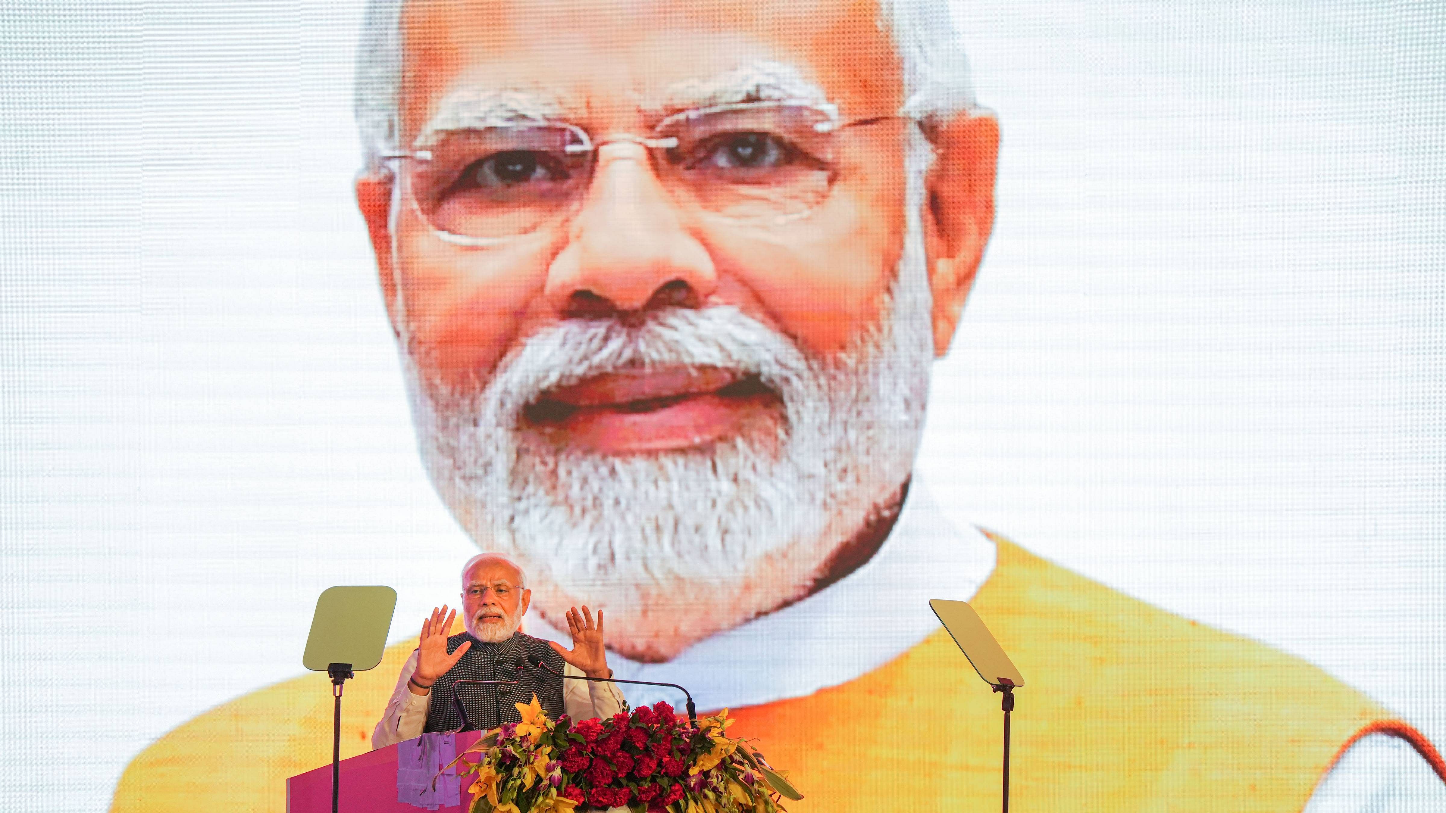 Prime Minister Narendra Modi addresses during the inauguration of Uttar Pradesh Global Investors Summit 2023, in Lucknow. Credit: PTI Photo