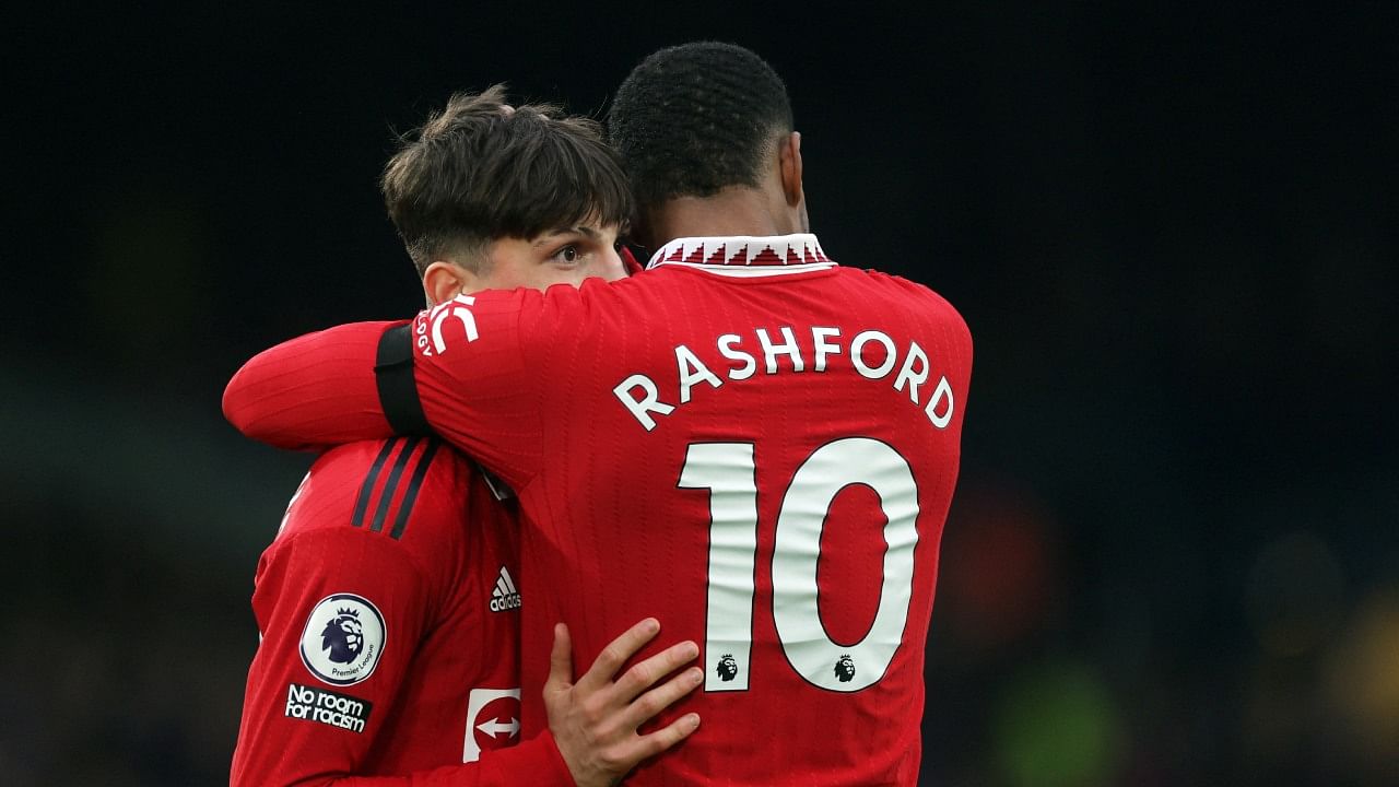 Manchester United's Alejandro Garnacho celebrates scoring their second goal with Marcus Rashford. Credit: Reuters Photo