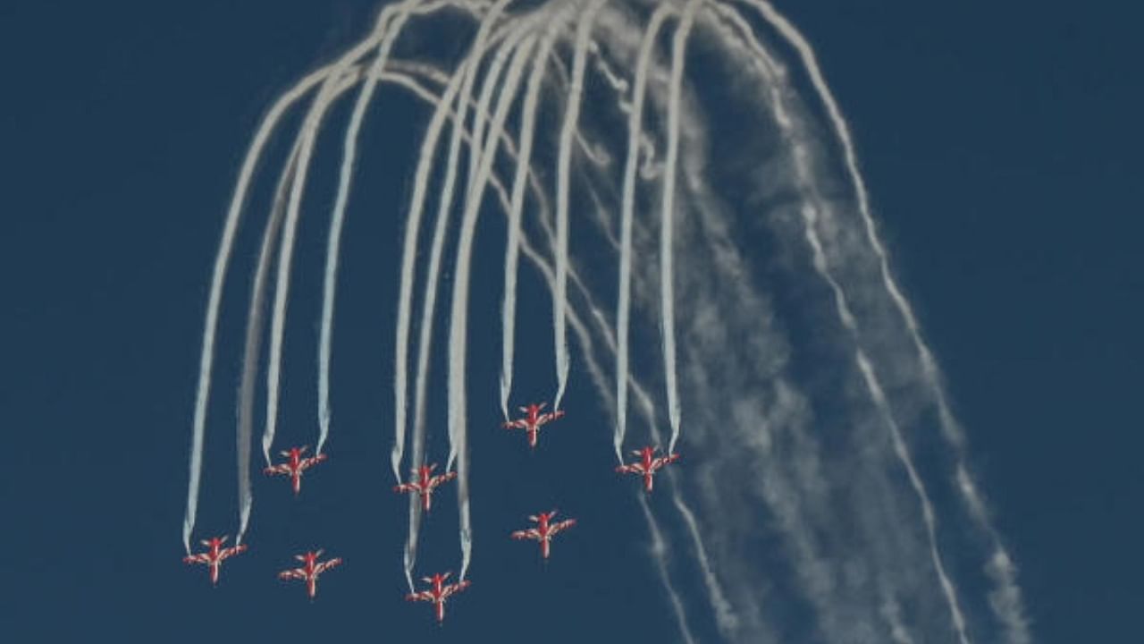 Indian Air Force (IAF) Suryakiran aerobatic team performs during the Aero India 2023 air show. Credit: DH Photo/S K Dinesh