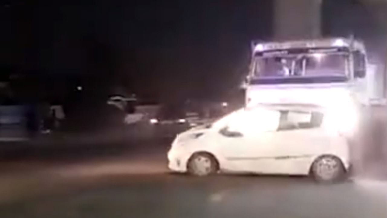 The inebriated driver of the container dragged a car for over 3 kms. Credit: Screengrab / YouTube
