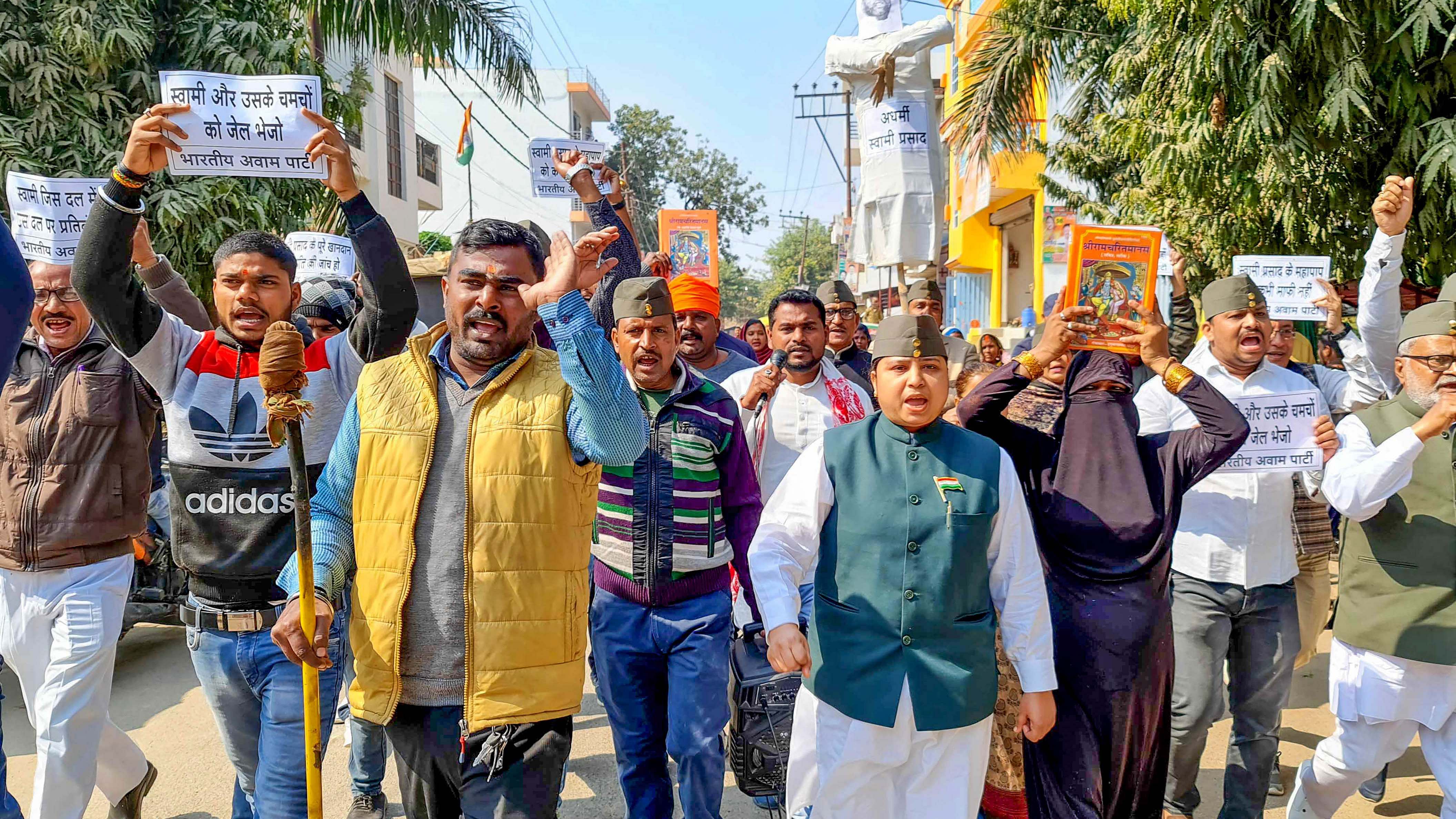 Members of Bharatiya Awam Party raise slogans during a protest against Uttar Pradesh Minister Swami Prasad Maurya over his alleged comments on the holy 'Ramcharit Manas'. Credit: PTI Photo