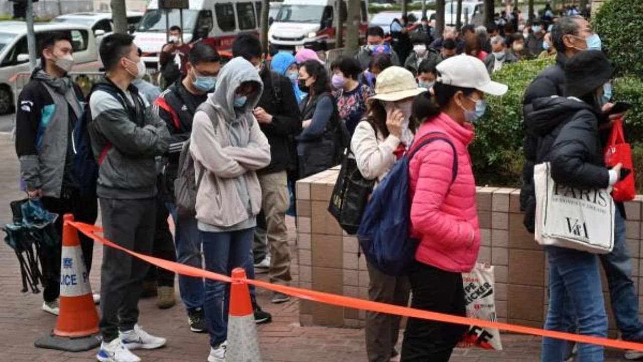 People outside a court in Hong Kong on February 6, 2023 as the trial of 47 of Hong Kong’s most prominent pro-democracy figures begins in the largest prosecution under the 2019 national security law that has crushed dissent in the city. Credit: AFP Photo