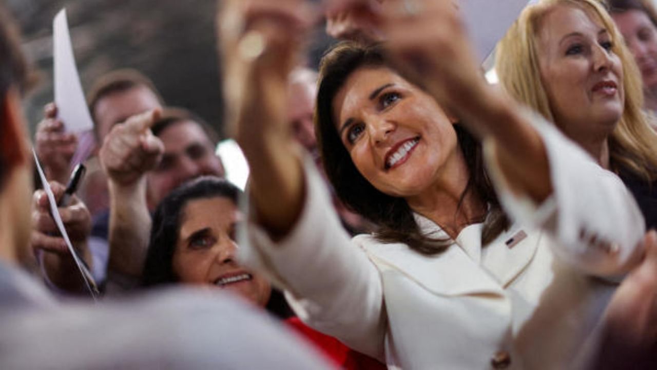 Former US Ambassador to the United Nations Nikki Haley takes pictures with her supporters at a campaign event in Charleston, South Carolina. Credit: Reuters Photo
