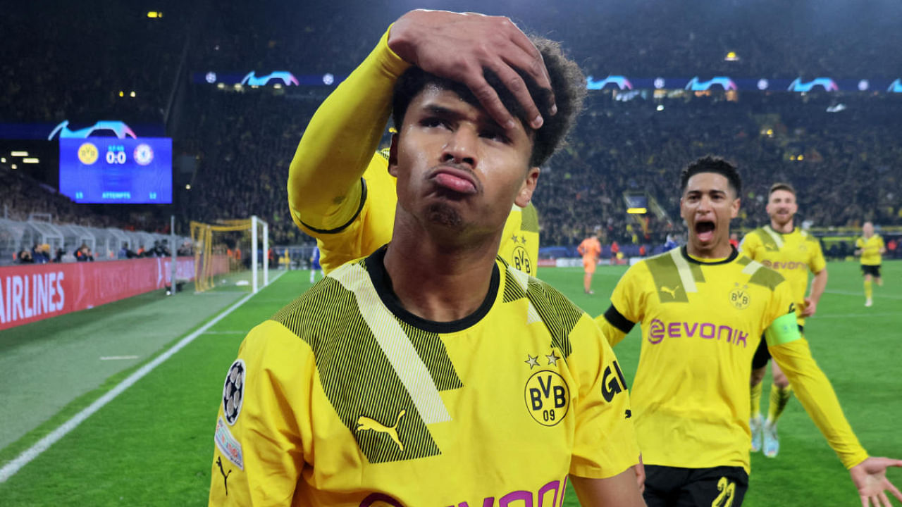 Borussia Dortmund's Karim Adeyemi celebrates scoring their first goal with Jude Bellingham. Credit: Reuters Photo