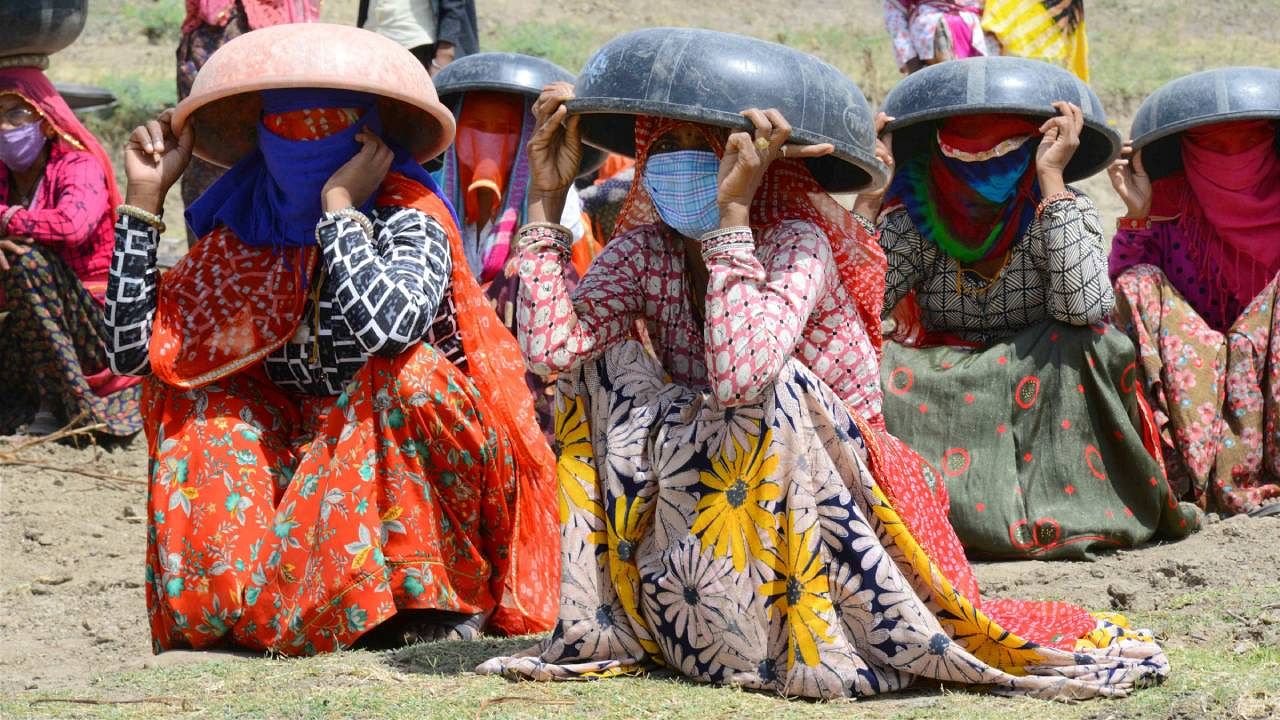 MGNREGA or NREGA, is a flagship scheme aimed at enhancing livelihood security of rural households by providing at least 100 days of guaranteed employment. Credit: PTI Photo