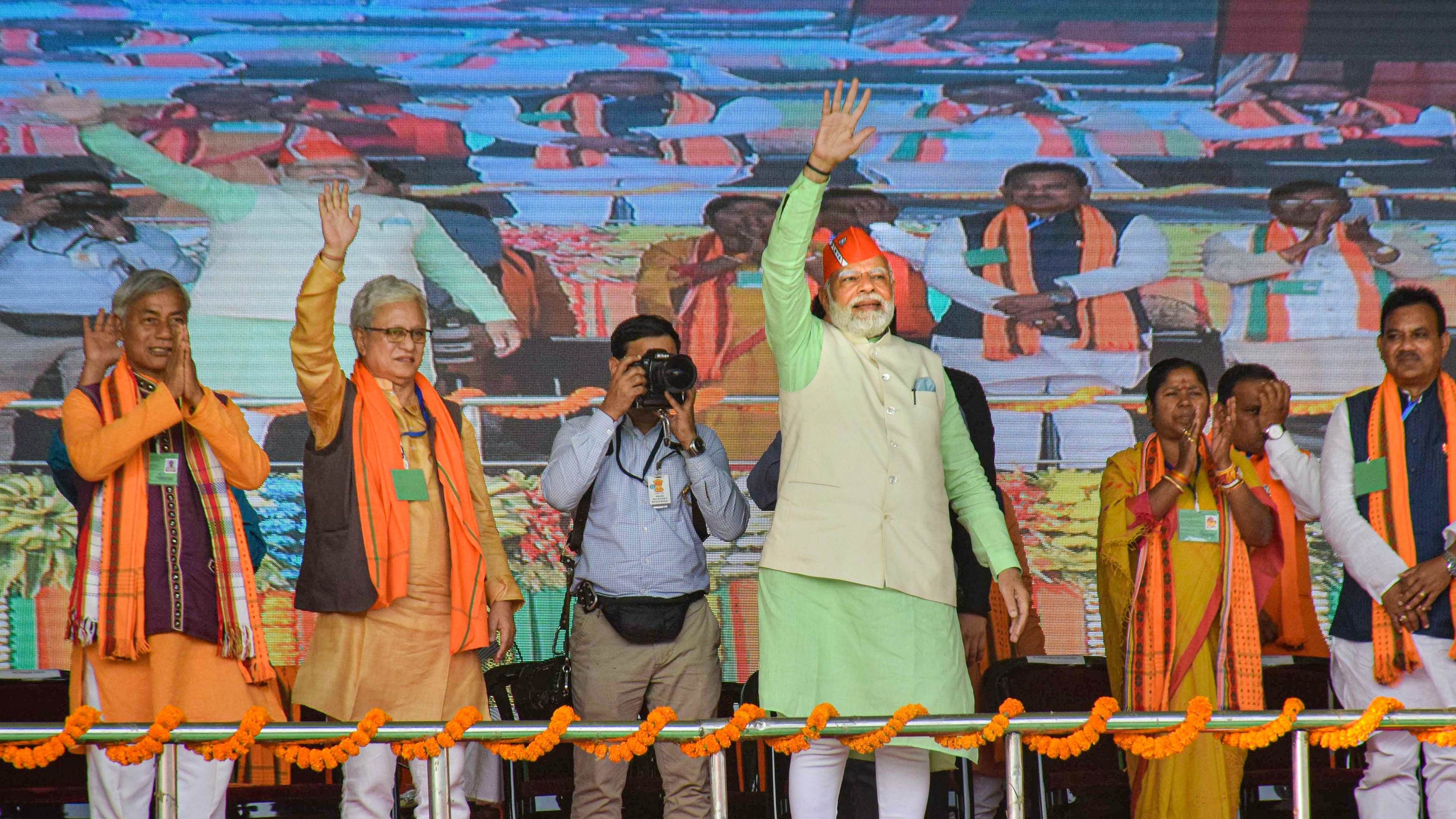 Prime Minister Narendra Modi with Tripura Chief Minister Manik Saha, BJP MP Pratima Bhoumik and other leaders during a public rally for the upcoming Tripura assembly elections. Credit: PTI Photo