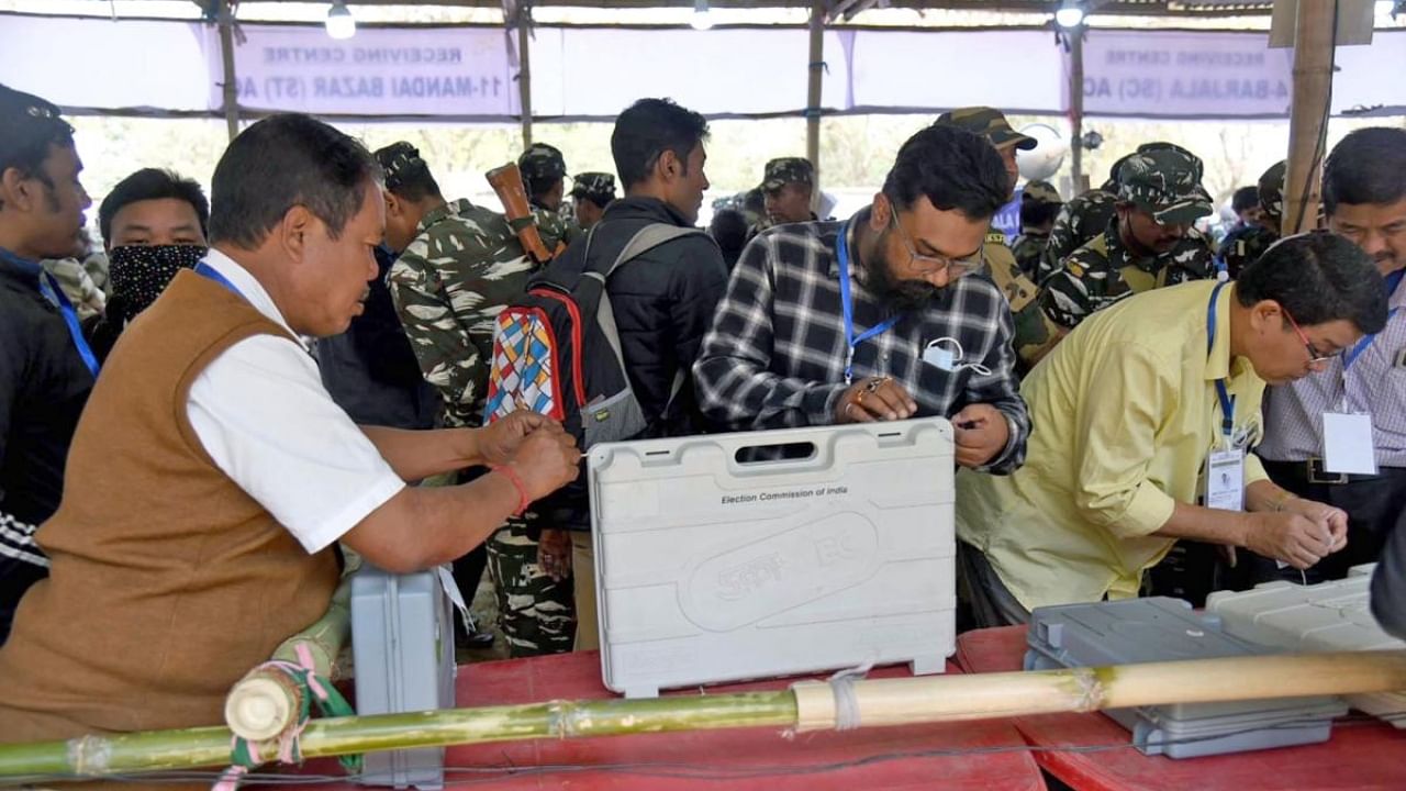 Polling officials collect EVMs and other election materials required for the Tripura Assembly Election 2023. Credit: IANS Photo