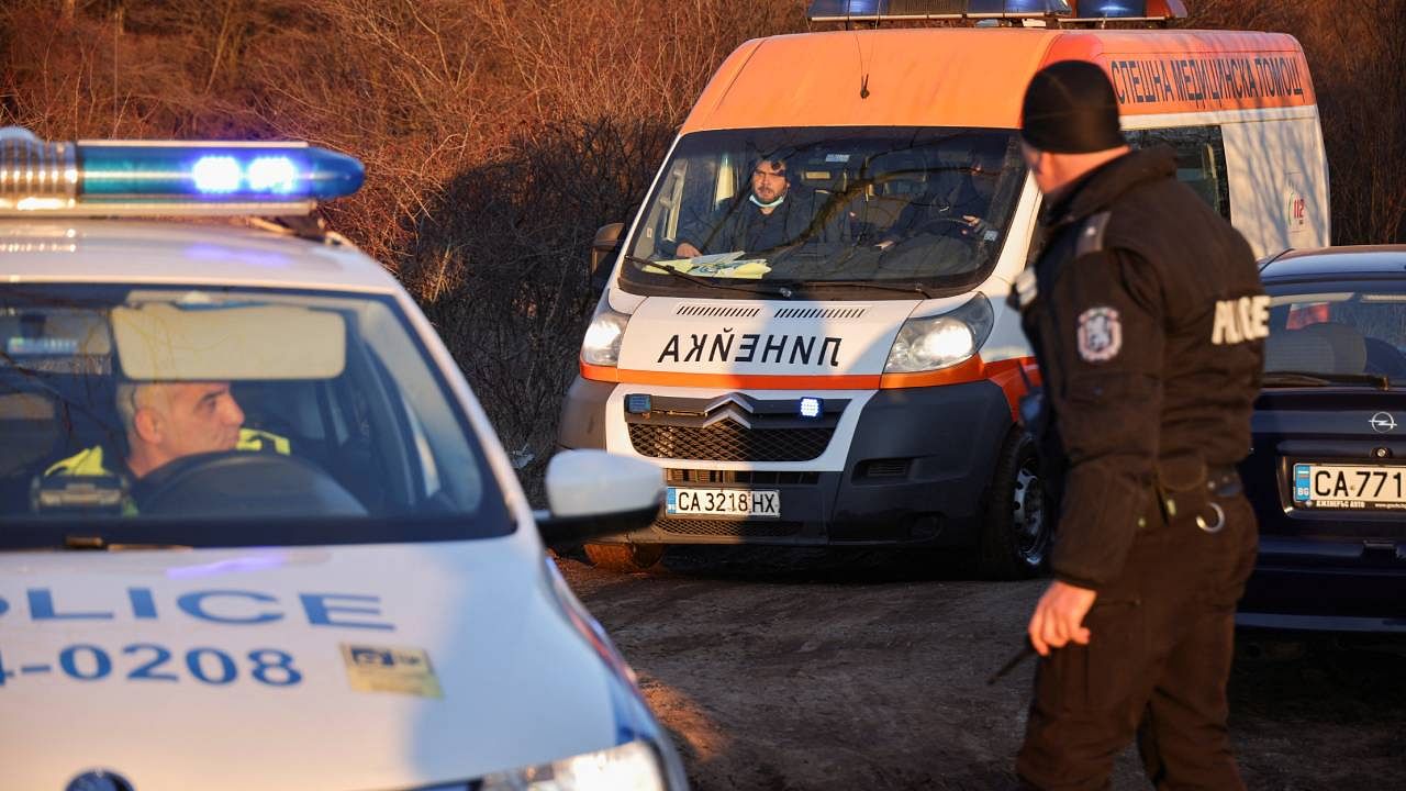 An ambulance leaves the site after at least 18 people were found dead in Bulgaria in an abandoned truck near the capital Sofia. Credit: Reuters Photo