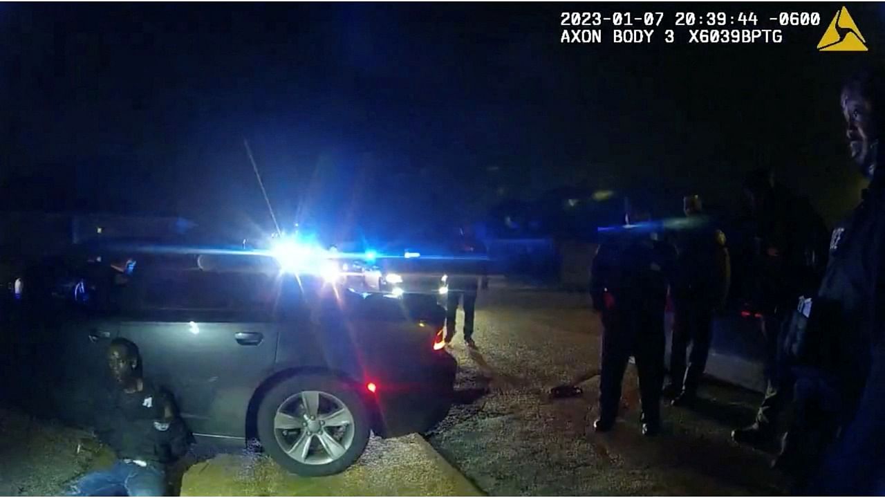 Tyre Nichols, a 29-year-old Black man who was pulled over while driving and died three days later, sits against a car after being beaten by Memphis Police Department officers on January 7, 2023. Credit: Reuters Photo