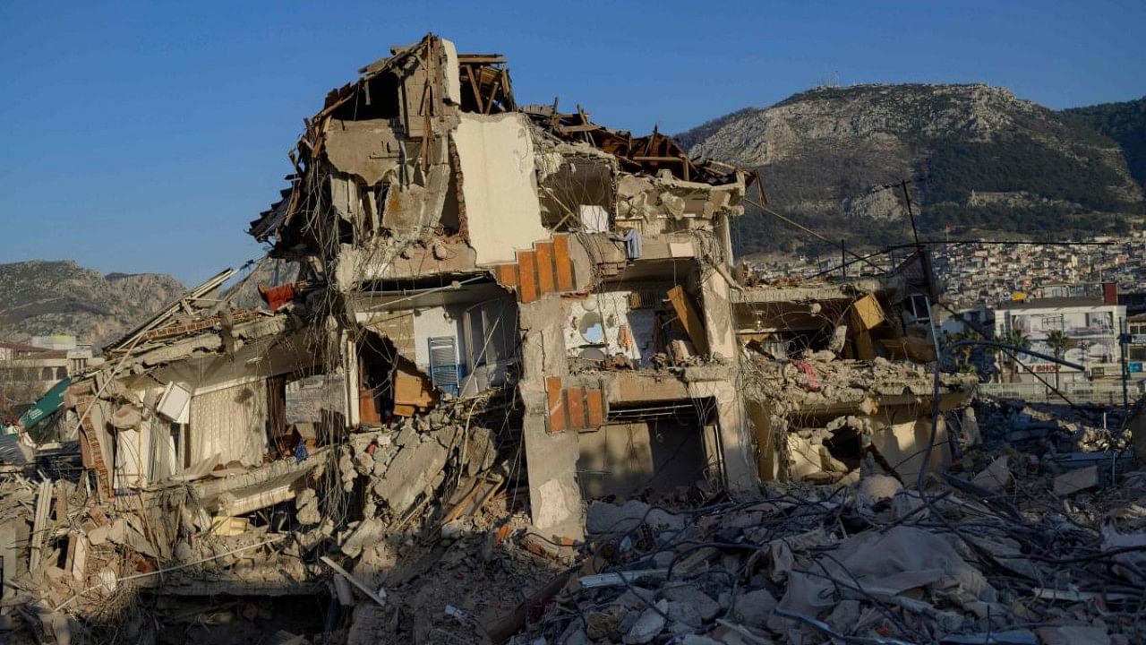Destroyed buildings, after a 7.8-magnitude struck the border region of Turkey and Syria. Credit: AFP Photo