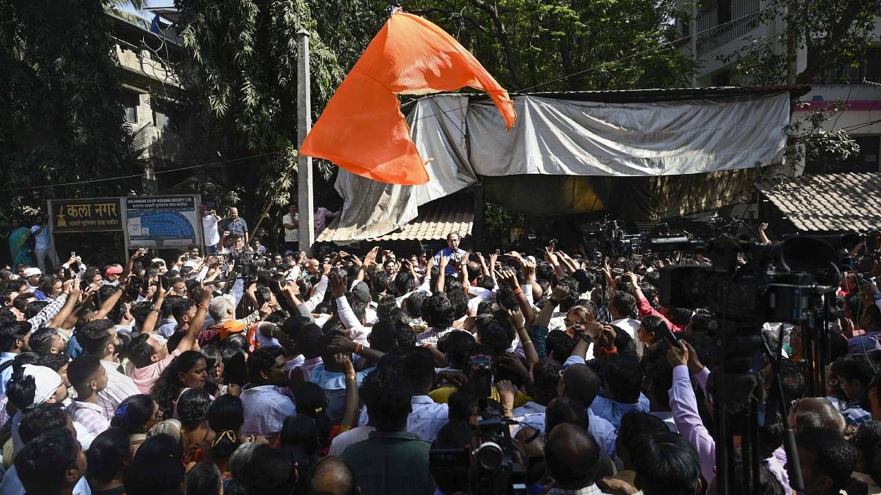 Uddhav Thackeray addresses supporters outside Matoshree. Credit: PTI Photo