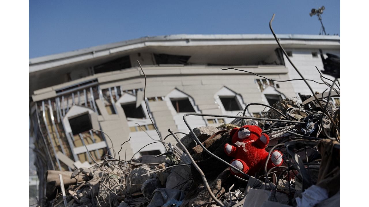 A toy lies amid the rubble, in the aftermath of the deadly earthquake, in Antakya, Turkey. Credit: Reuters Photo