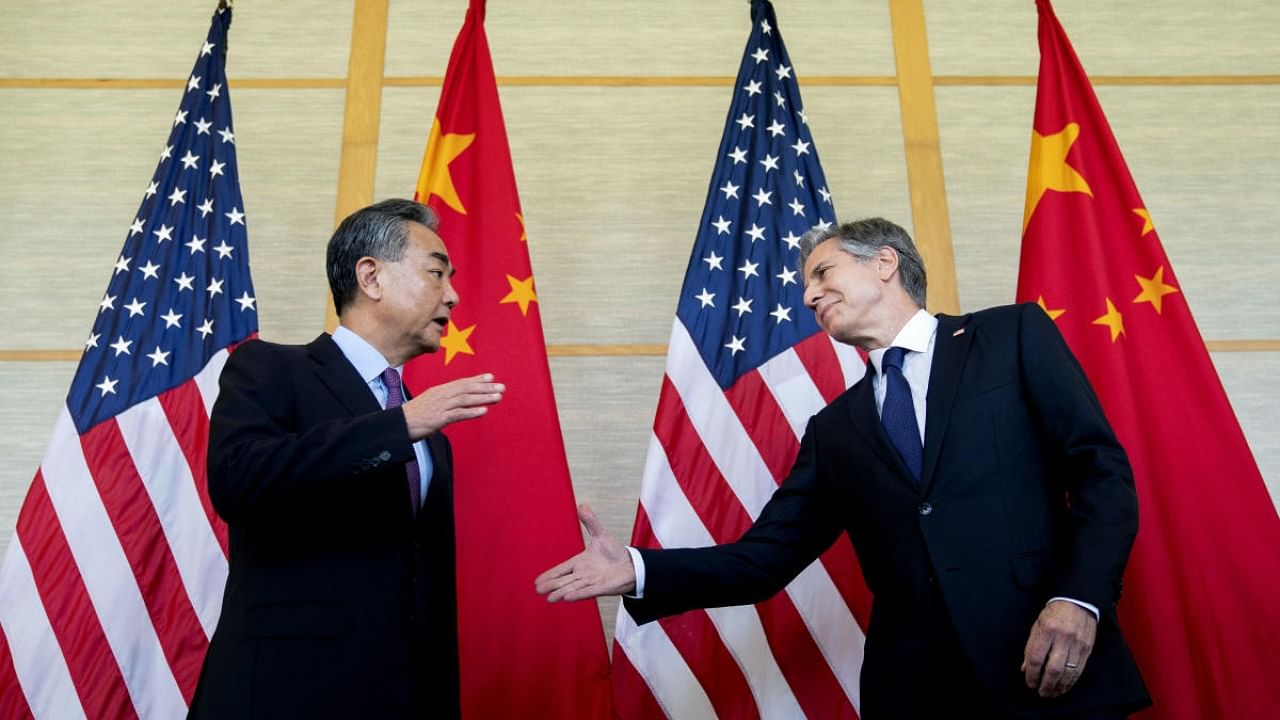 US Secretary of State Antony Blinken (R) with China's Foreign Minister Wang Yi (L). Credit: AFP Photo