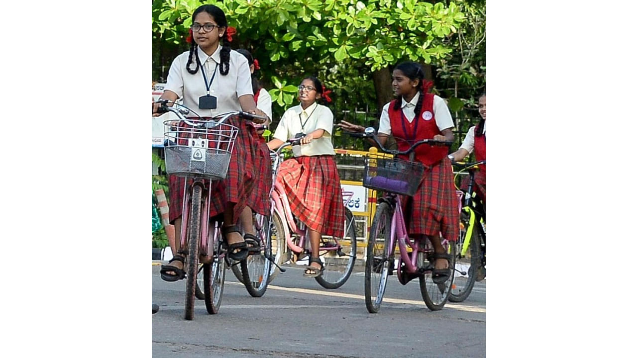 The cycles were distributed to those getting admissions to class 8 at government and aided schools in the state. Credit: Prajavani File Photo