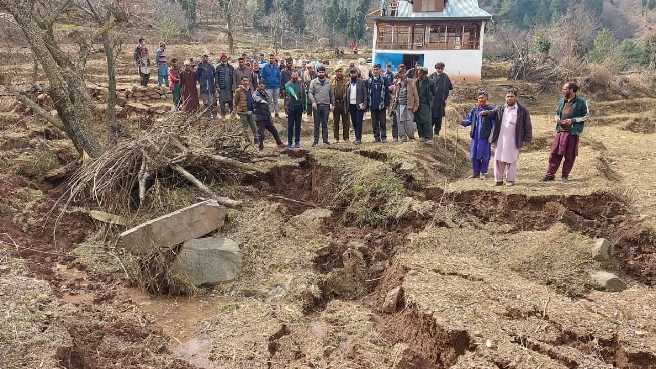 Residents in J&K's Ramban after Sunday's landslide. Credit: IANS Photo