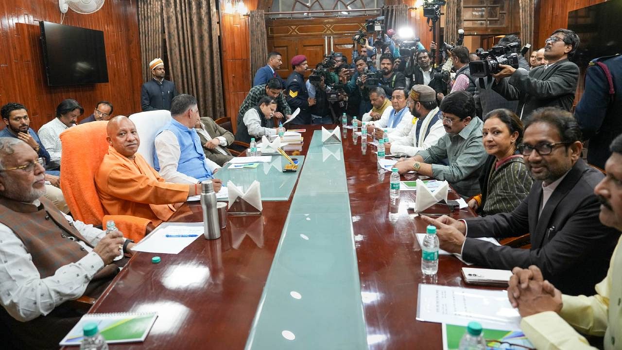 Uttar Pradesh Chief Minister Yogi Adityanath with State Assembly Speaker Satish Mahana and others attends the all-party meeting before the Budget Session of the State Assembly. Credit: PTI Photo