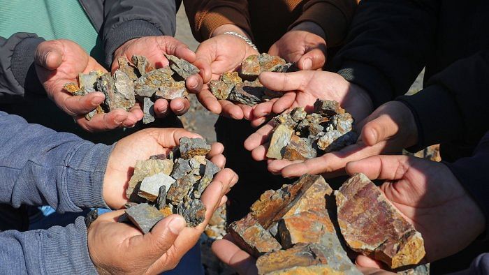 Villagers show lithium stones in Reasi district. Credit: PTI Photo 