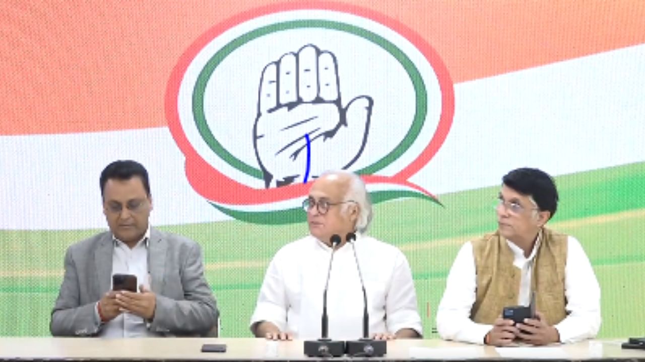 Congress leaders Jairam Ramesh and Pawan Khera address the media post the ED raids in Raipur. Credit: Twitter/@INCIndia