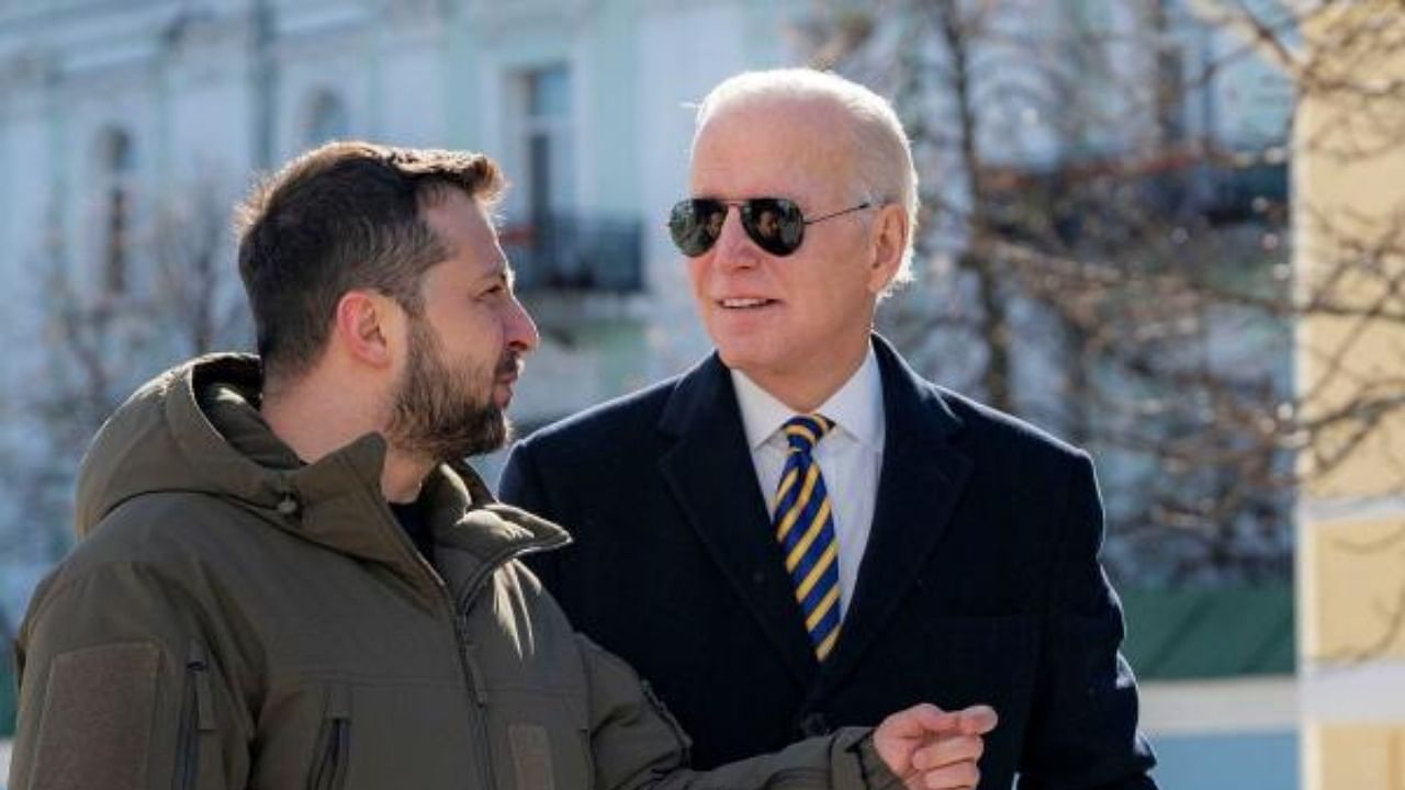 US President Joe Biden walking next to Ukrainian President Volodymyr Zelenskyy in front of St. Michael’s Golden-Domed Cathedral in Kyiv. Credit: AFP Photo / Handout of the Ukrainian Presidential Press Service