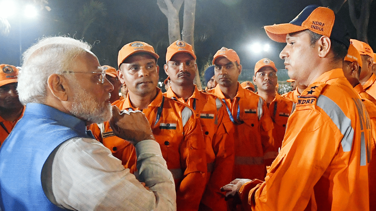 Prime Minister Narendra Modi interacts with NDRF personnel involved in ‘Operation Dost’ in Türkiye and Syria, in New Delhi. Credit: PTI Photo