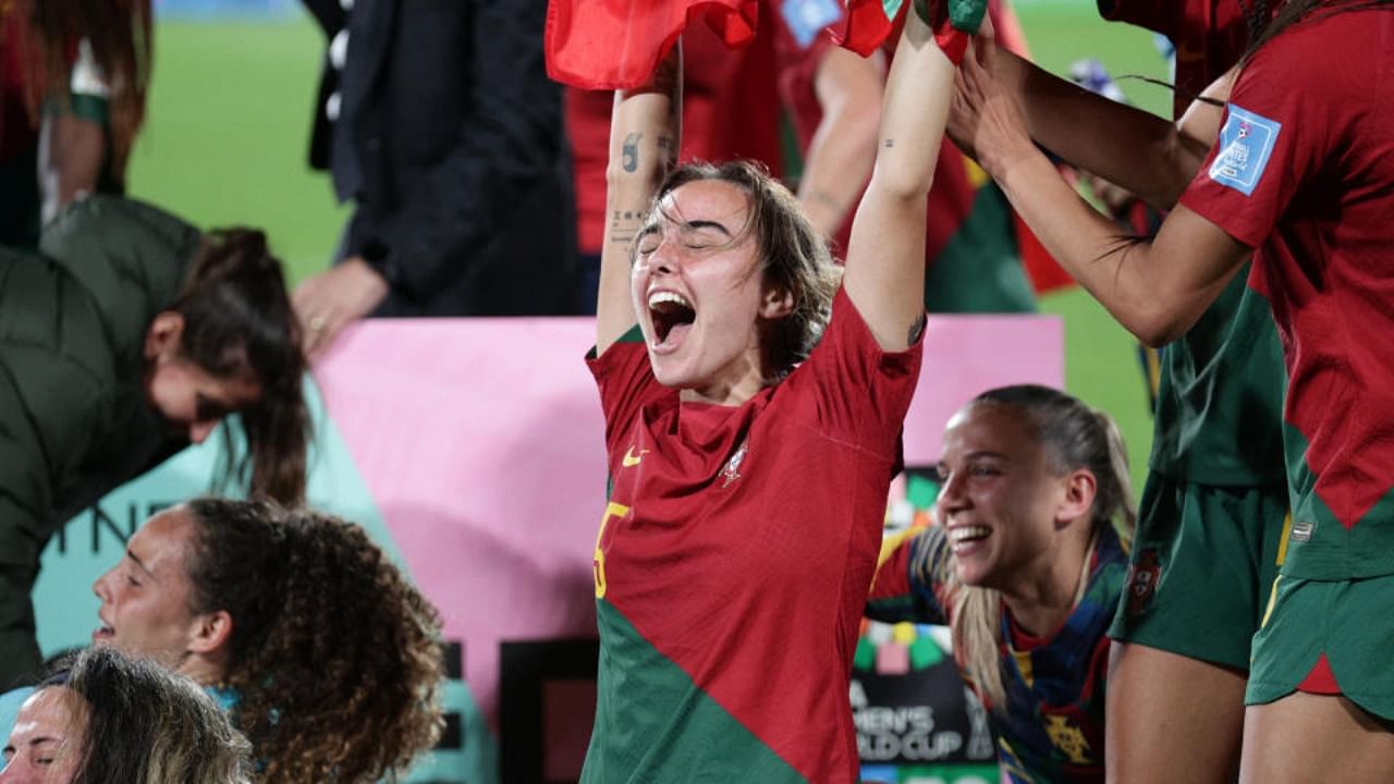 Portugal's Joana Marchao celebrates with teammates after qualifying for the Women's World Cup. Credit: Reuters Photo