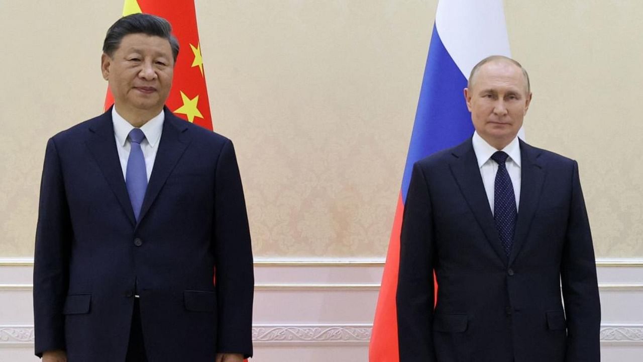 File photo of China's President Xi Jinping and Russian President Vladimir Putin. Credit: AFP Photo