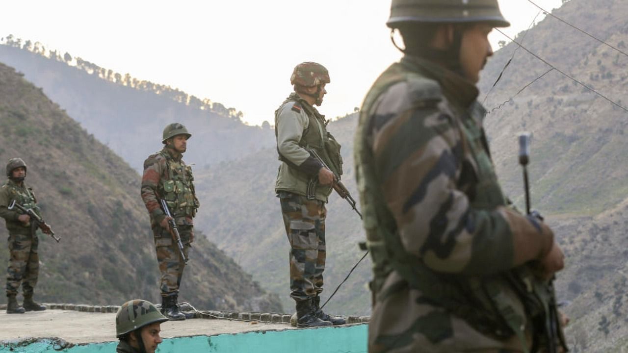  Army personnel stand guard near Nai Basti area, in Doda district, Jammu & Kashmir. Credit: PTI Photo